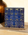 Square, blue and gold christmas card with ornamental pattern
