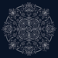 Elegant art print of white botanical motifs in a circular design against a indigo blue background